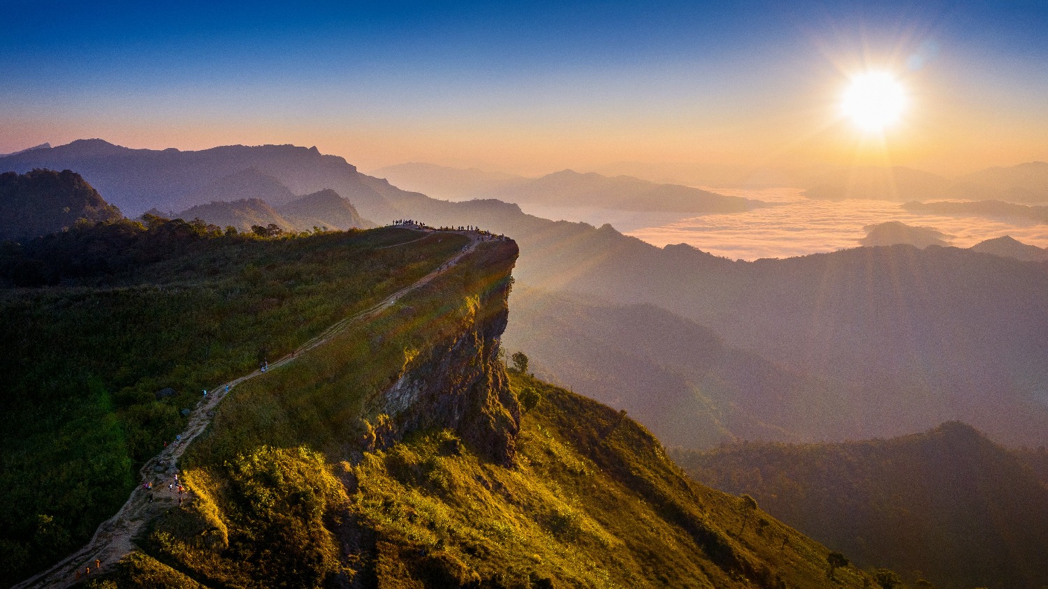 phu-chi-fa-mist-sunrise-chiang-rai-province-thailand.jpg
