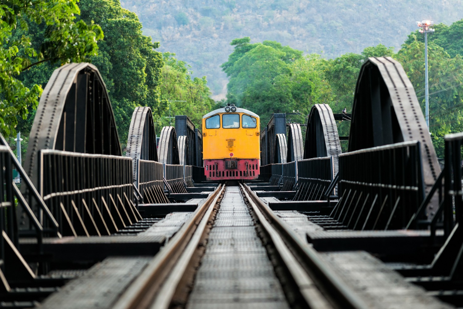 train-into-railway-bridge-kanchanaburi.jpg