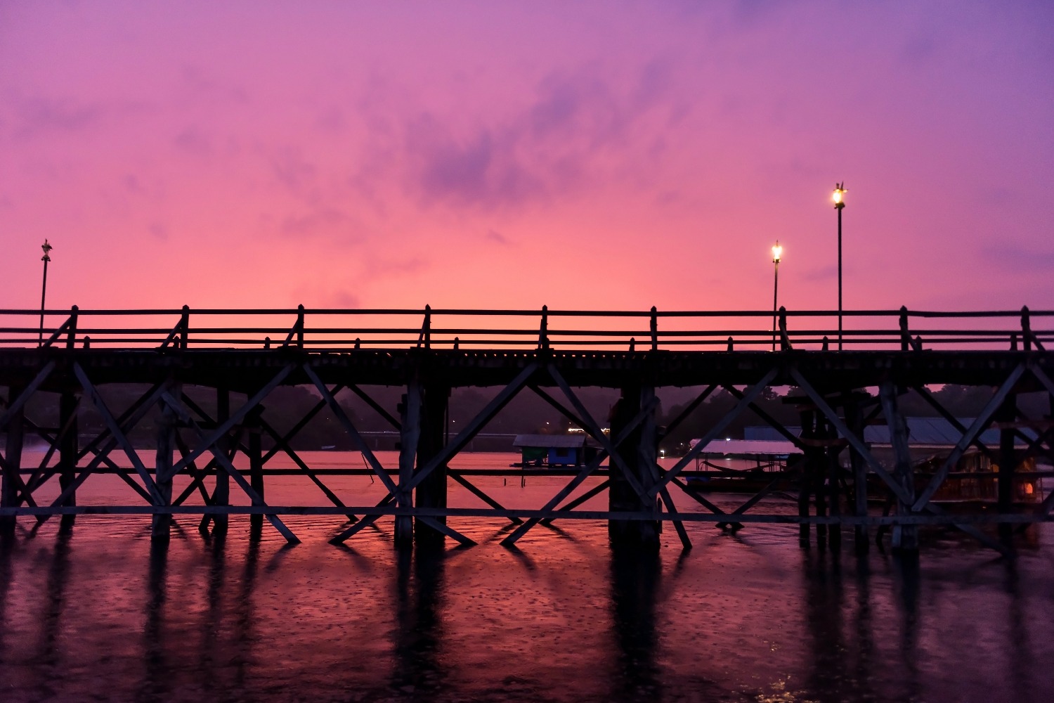 mon-wooden-bridge-floating-raft-with-heavy-rain-songkalia-river-with-twilight-sk.jpg
