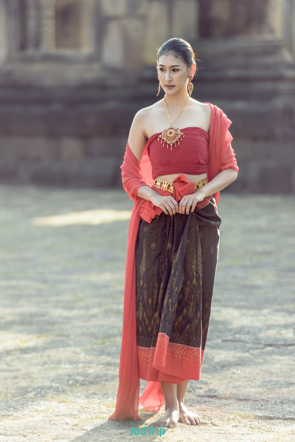 women-s-traditional-dress-walking-khmer-castle.jpg