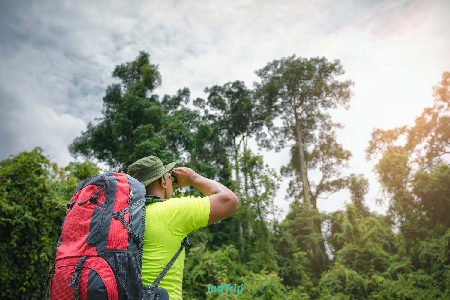 young-male-tourists-carrying-backpack-travel-by-hitchhiking-travel-by-hitchhikin.jpg