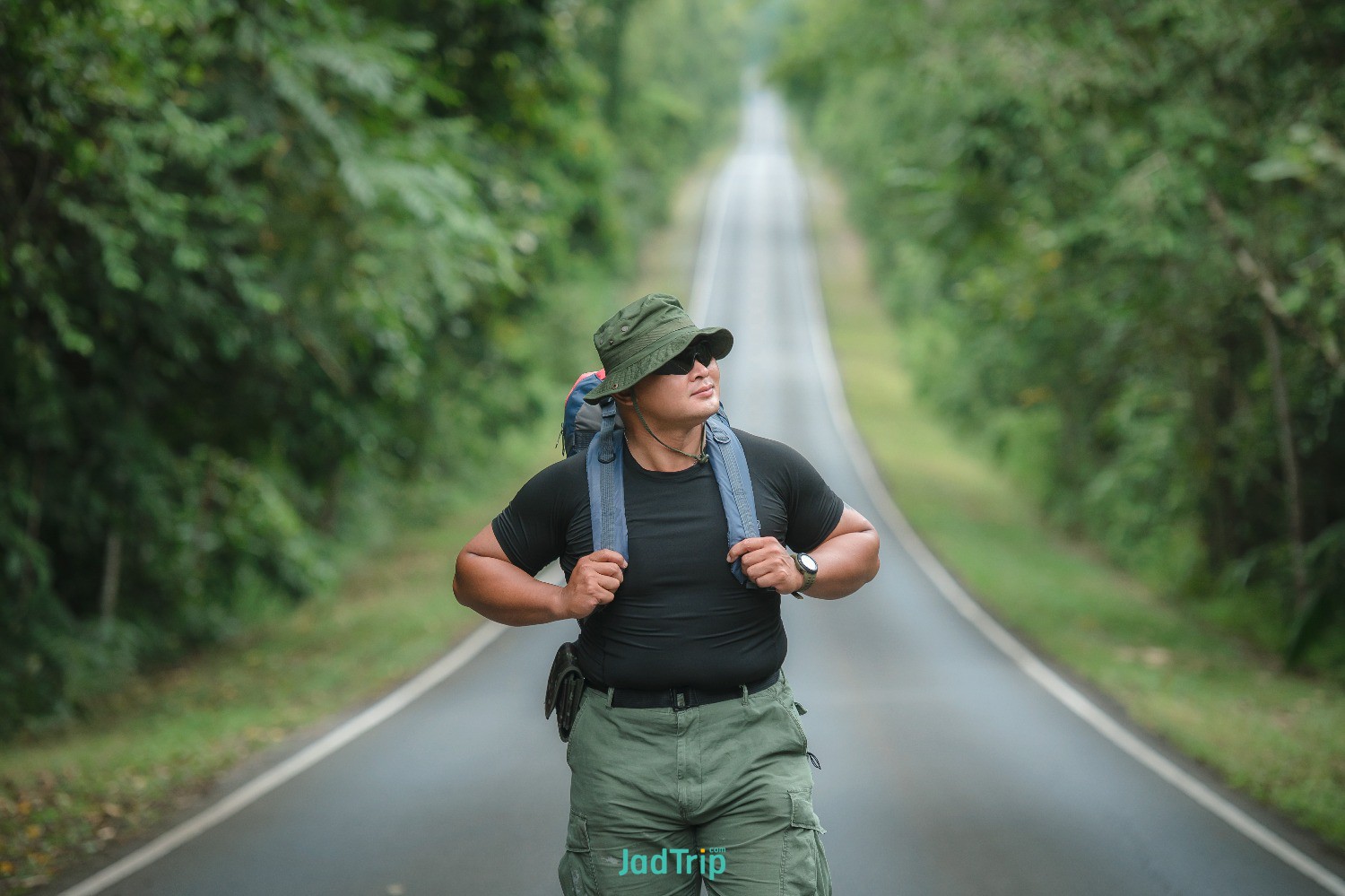 young-male-tourists-carrying-backpack-travel-by-hitchhiking-travel-by-hitchhikin.jpg