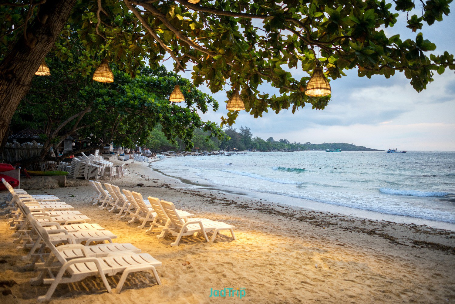 chairs-with-lamp-tree-is-foreground-beach-samet-island-morning-koh-samet-thailand.jpg