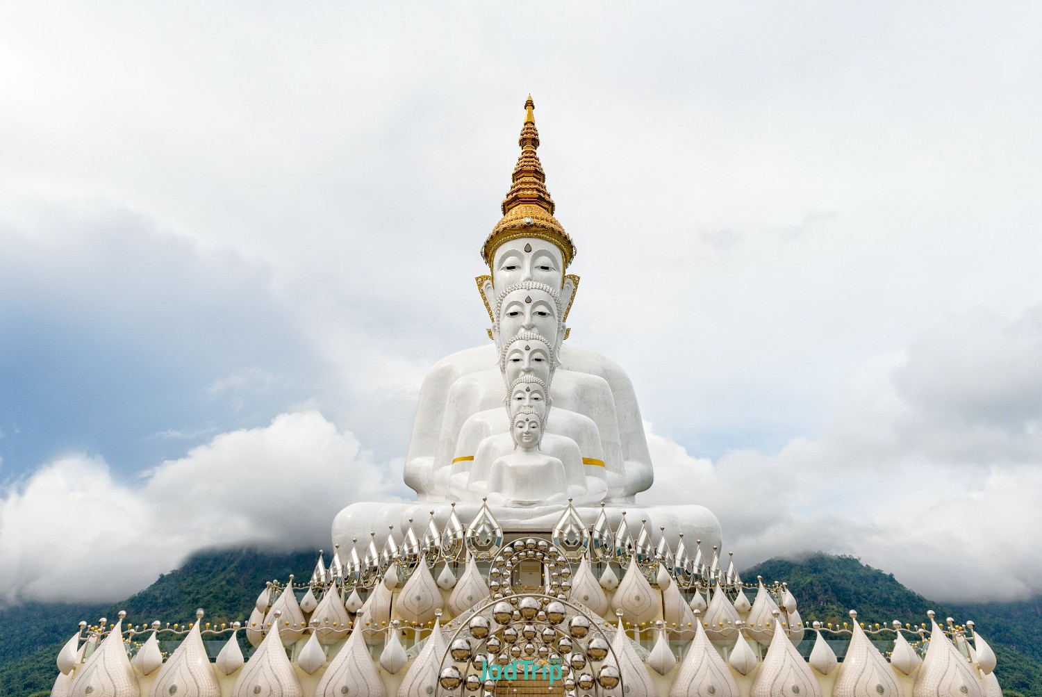 buddha-statue-has-large-white-five-body-mountain-surrounded-by-nature-with-cloud.jpg