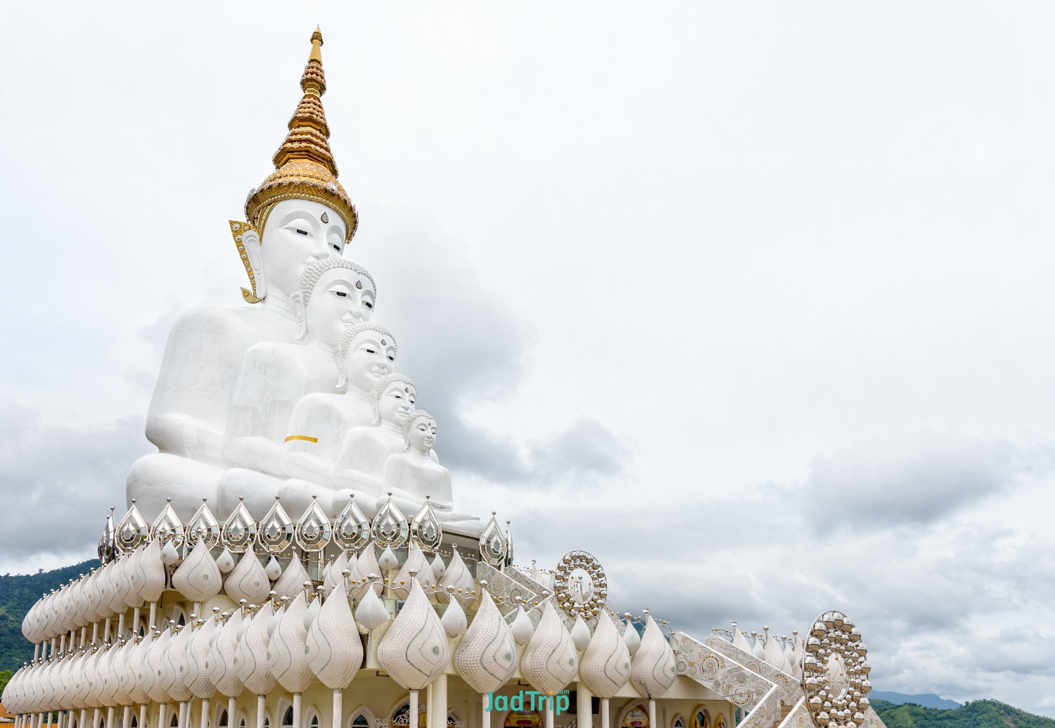 buddha-statue-has-large-white-five-body-mountain-surrounded-by-nature-with-cloud.jpg