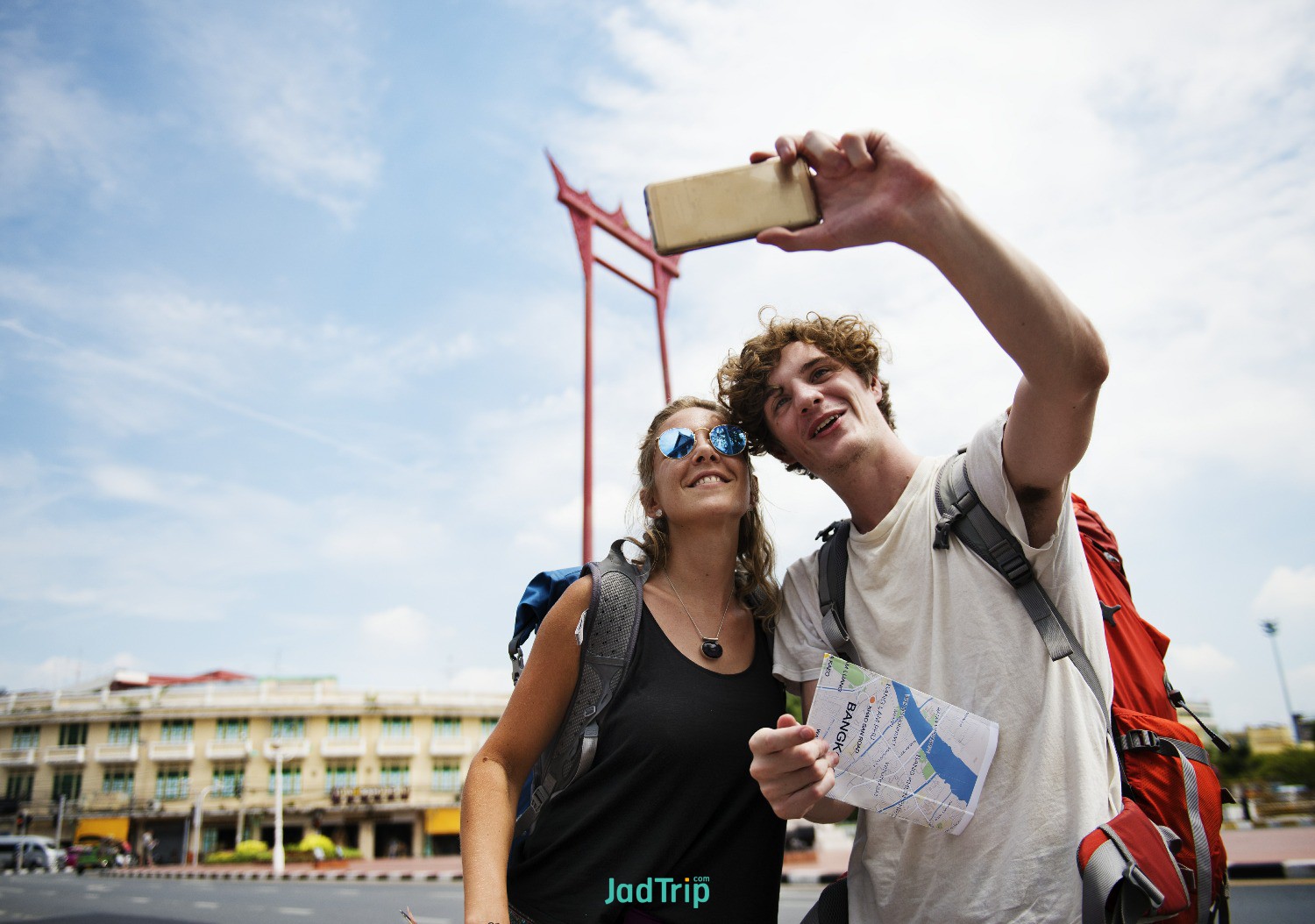 tourists-couple-taking-selfie-with-giant-swing-bangkok-thailand.jpg