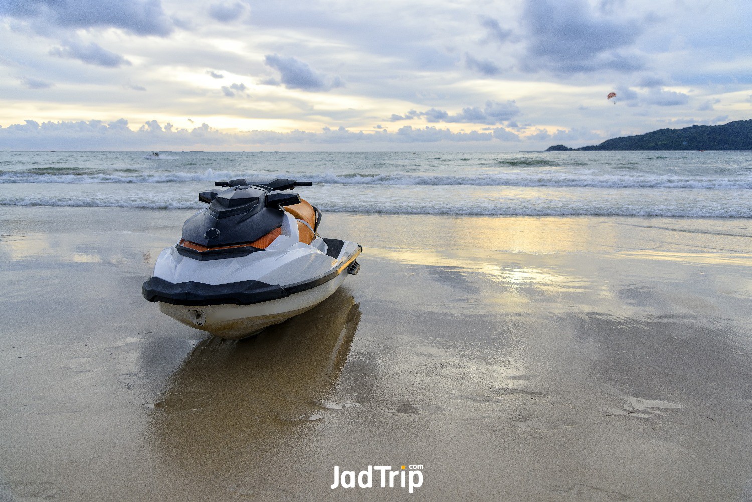 jet-ski-water-scooter-parking-beach-evening-time-with-sunset-scene.jpg