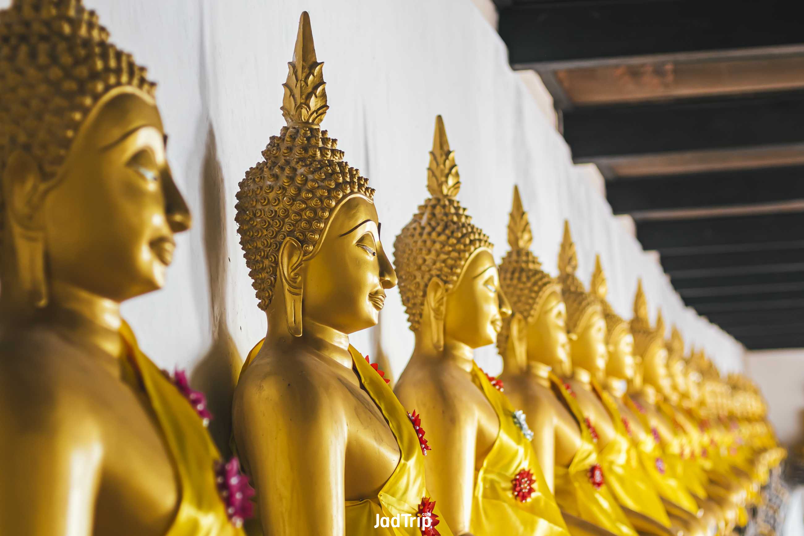seated-golden-buddha-statues-row-atwat-phutthaisawan-temple-reclining-buddha-ayu.jpg